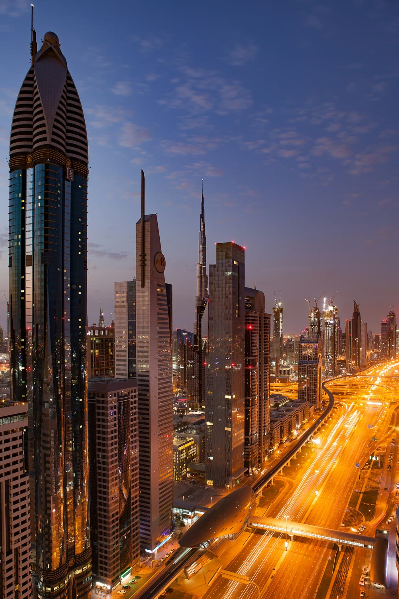Towers along Sheikh Zayed Road, Dubai, at dusk